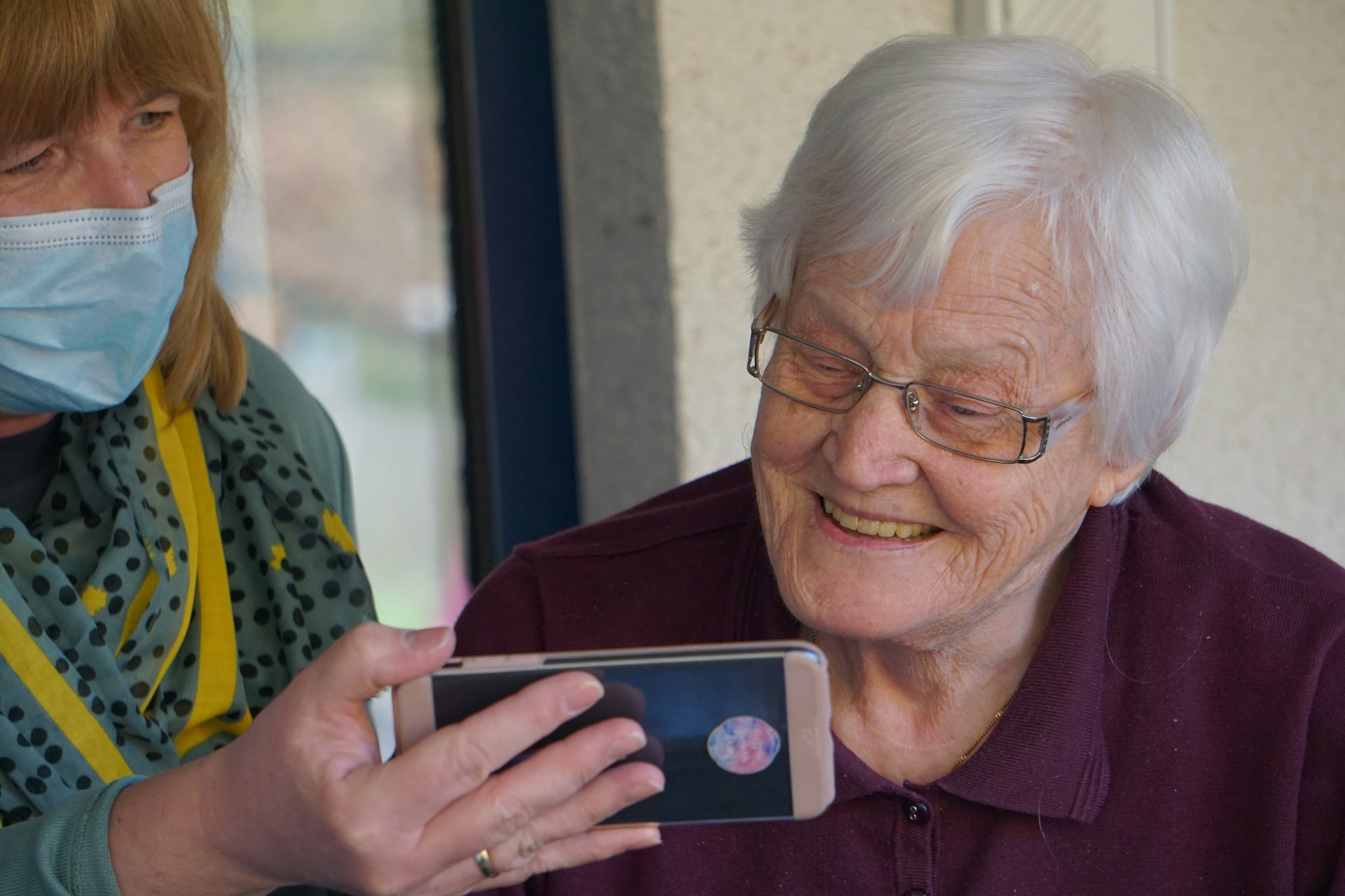 Senior Woman Receiving Hearing Advice with Precautions - Candid Hearing